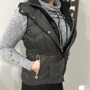 Michael Kors gray and black ultralight down fill vest size small.